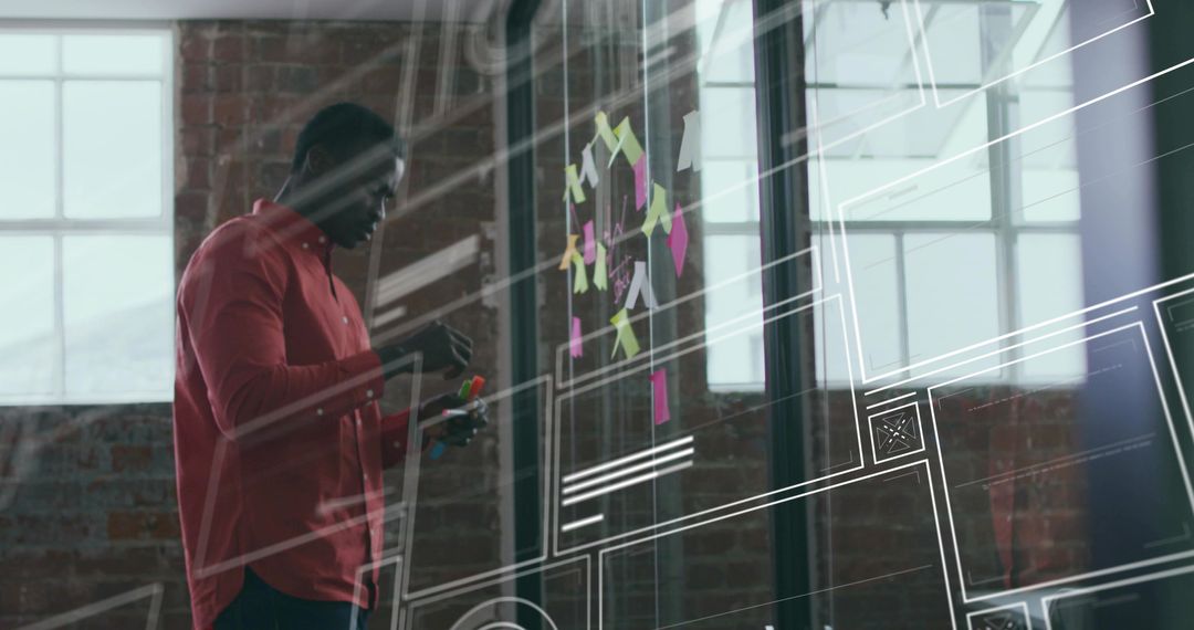 Creative Professional Planning with Sticky Notes in Loft Workspace