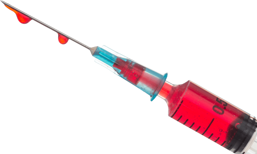 Transparent Syringe Containing Red Liquid Up Close