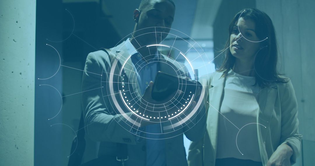 Professionals Analyzing Data on Tablet with Digital Interface