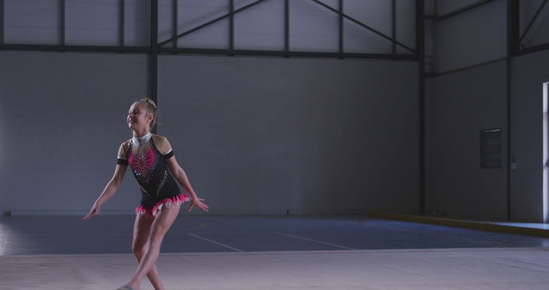 Young Gymnast Performing Routine in Gymnasium - Free Images, Stock Photos and Pictures on Pikwizard.com