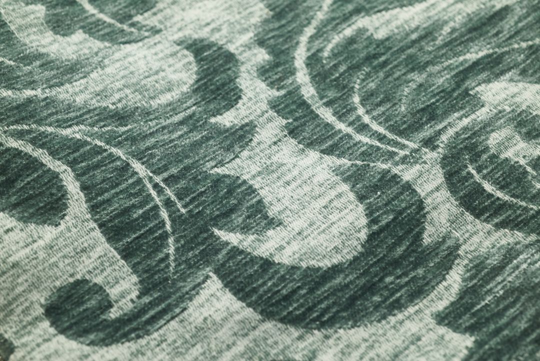 Featuring green ornamental knit fabric texture with vintage damask swirl pattern