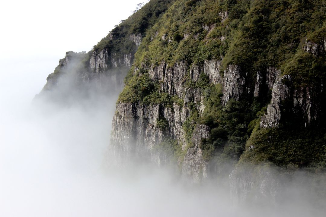 Misty Mountain Cliffs with Dense Fog