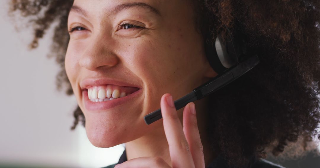 Cheerful Customer Support Agent on Headset Smiling - Free Images, Stock Photos and Pictures on Pikwizard.com