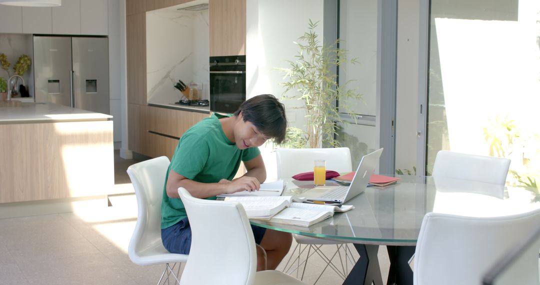 College Student Focused on Study at Home