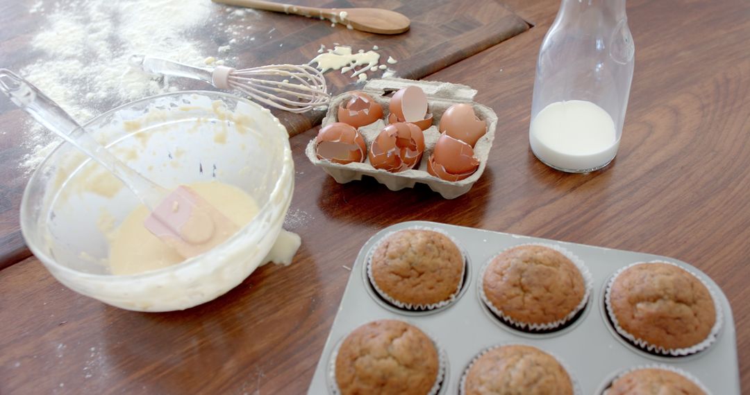 Homemade Baking Scene on Rustic Kitchen Table with Muffins