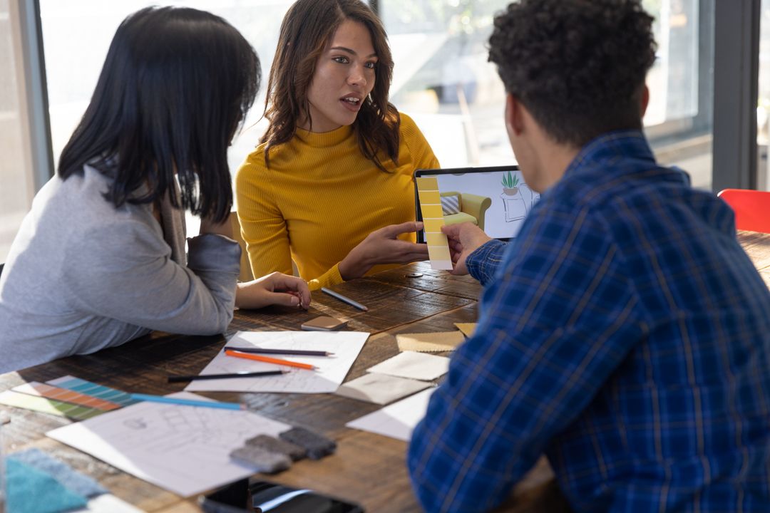 Creative Professionals Collaborating on Interior Design Project