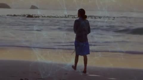 Person on Beach with Digital Networking Overlay