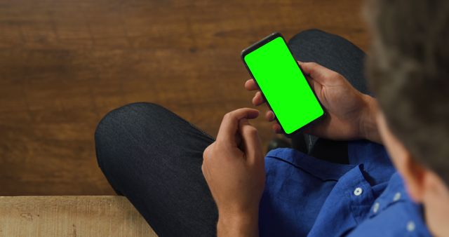 Person Holding Smartphone with Green Screen for Mockup - Download Free Stock Images Pikwizard.com