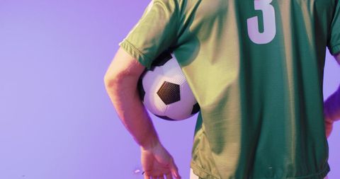 Soccer Player Holding Ball with Celebratory Confetti - Download Free Stock Images Pikwizard.com
