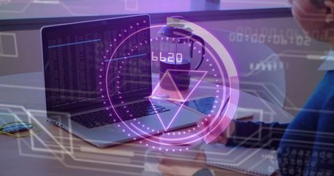 Developer Coding on Laptop with Purple HUD Overlay for Data Analysis and AR Visualization