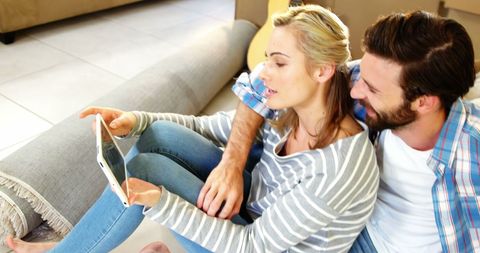 Couple Relaxing Together Using Tablet at Home - Download Free Stock Images Pikwizard.com