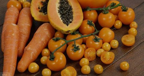 Fresh Orange Produce Assortment on Wooden Table