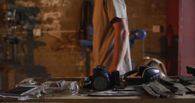 Dust Mask and Safety Earmuffs on Workbench in Workshop - Download Free Stock Images Pikwizard.com