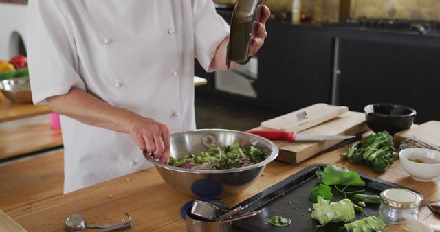 Chef Preparing Fresh Salad in Modern Kitchen - Download Free Stock Images Pikwizard.com