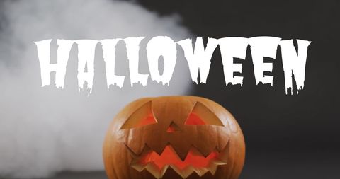 Carved Pumpkin with Halloween Text and Foggy Background - Download Free Stock Images Pikwizard.com