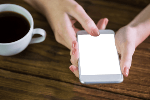 Transparent smartphone mockup in female hands