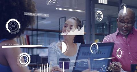 Team of Data Analysts Collaborating with Digital Graphs