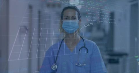 Clinician analyzing holographic health data in hospital corridor for cost analytics
