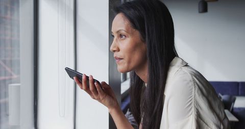 Confident Businesswoman Using Smartphone for Communication - Download Free Stock Images Pikwizard.com