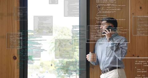 Business professional analyzing code overlays by office window