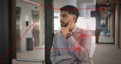 Thoughtful Professional in Modern Office Setting