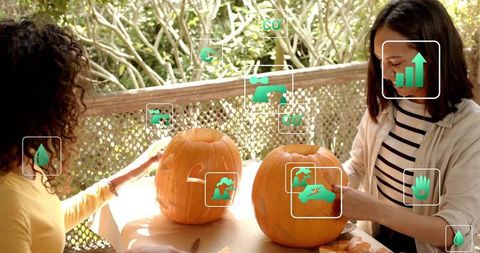 Carving pumpkins on porch with friends crafting autumn decorations and cozy diy fun