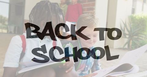 Diverse schoolchildren smiling with overlaid back to school text