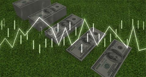 Us dollar banknotes with financial graph on grass