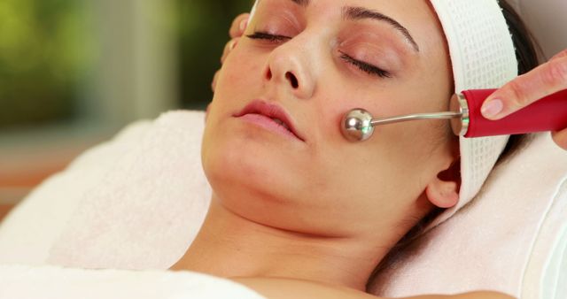 Pretty brunette getting micro dermabrasion treatment at the spa - Download Free Stock Photos Pikwizard.com