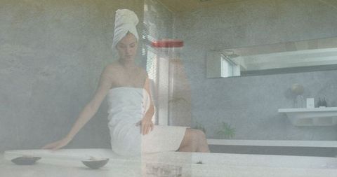 Woman Enjoying Tranquility in Elegant Spa Setting