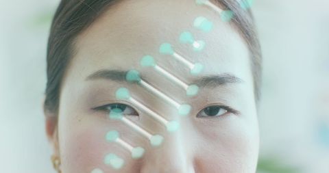 Dna strand over female face conceptual symbol of genetic research