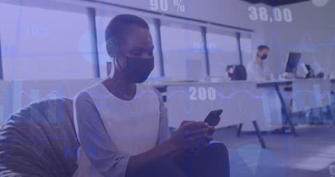 Masked Businesswoman Analyzing Financial Data in Modern Office