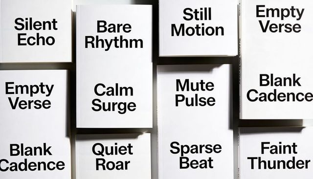 Arranging minimal monochrome book covers with bold sans serif grid and dramatic shadows