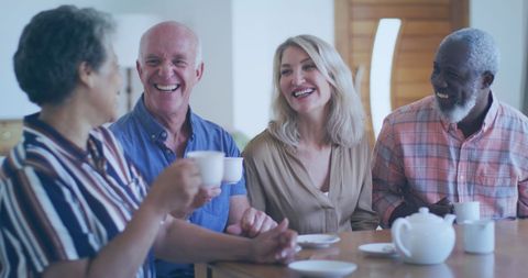 Diverse Friends Enjoying Coffee Together at Home - Download Free Stock Images Pikwizard.com