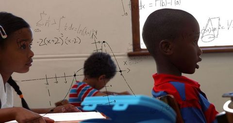 Children Engaged in Math with Overlayed Formulas in Classroom