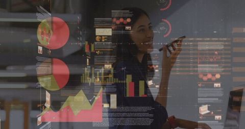 Businesswoman Analyzing Data Over Digital Interface in Modern Office - Download Free Stock Images Pikwizard.com