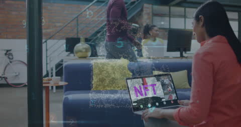 Businesswoman on Laptop Video Call Discussing NFTs with Colleagues