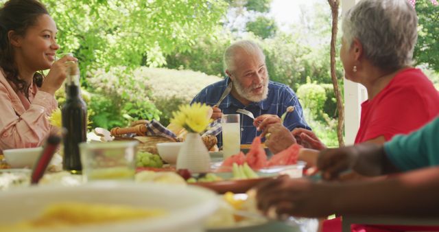 Happy Family Enjoying Outdoor Summer Meal in Backyard Garden - Download Free Stock Images Pikwizard.com