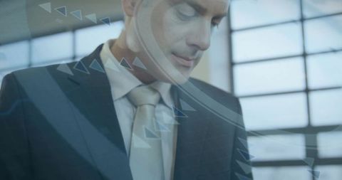 Executive studying HUD analytics overlay in glass office, corporate leadership concept