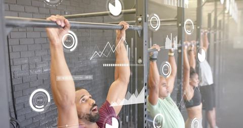 Diverse group dealing with fitness and data analytics in gym