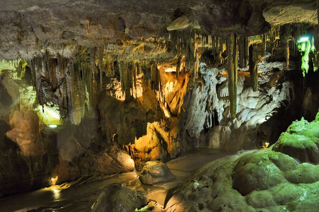 Intricate Stalactite and Stalagmite Formations in Underground Cave - Download Free Stock Photos Pikwizard.com
