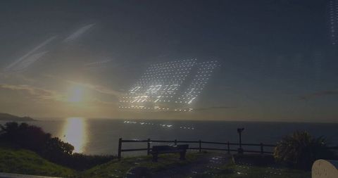 Digital Code Overlay on Coastal Overlook at Sunset