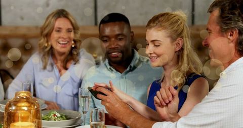 Joyful Diverse Friends Dining and Sharing Moments