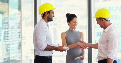 Diverse Architects Collaborating Sustainability Office