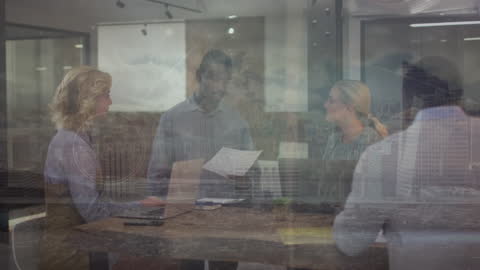 Business Team Analyzing Financial Data in Modern Office