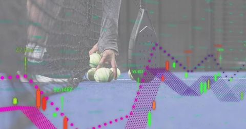 Crouching player picking balls on blue court with racket and analytics overlay