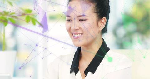 Smiling Business Woman Analyzing Data with Digital Network Overlay