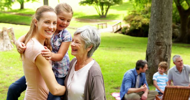 Three Generations of Women Enjoying Family Picnic in Park - Download Free Stock Images Pikwizard.com