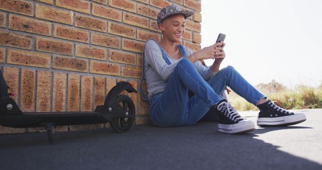 Teen Girl Urban Leisure Relaxing with Phone Outdoors by Scooter - Download Free Stock Images Pikwizard.com