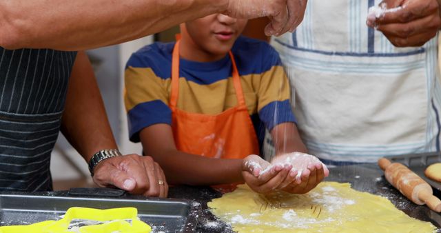 Family Baking Together, Hands Sprinkling Flour on Dough, Child Helping - Download Free Stock Images Pikwizard.com